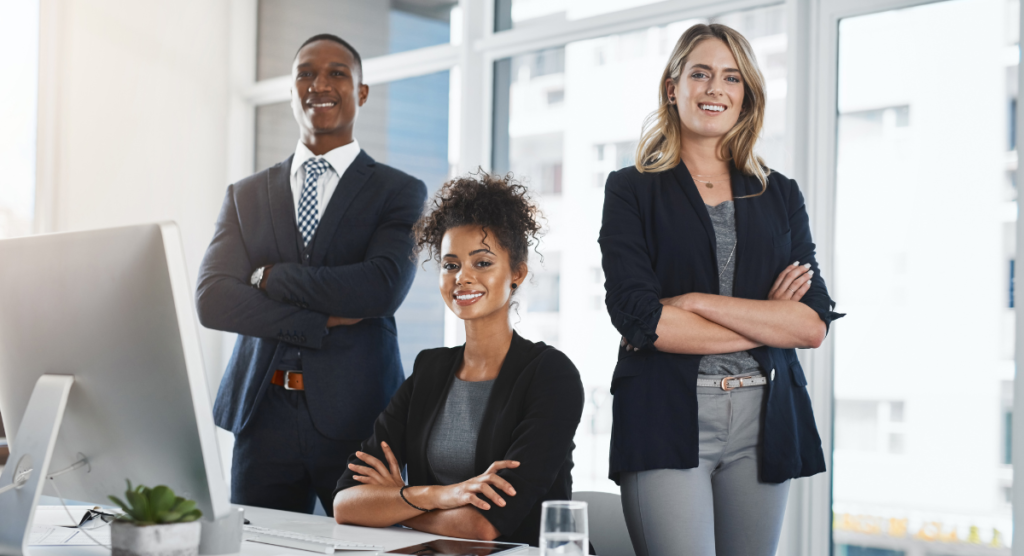 A confident team standing together, symbolizing how embedding a clear product story across every touchpoint turns SaaS value from invisible to unmistakable.