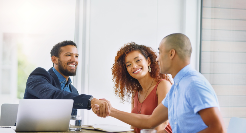 A team celebrates a successful signup with a handshake, symbolizing early adoption while hinting that only a few users will fully master the tool without clearer product stories.