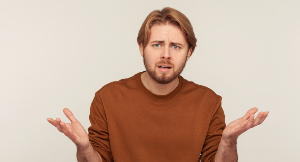 A confused user shrugging, reflecting how SaaS products become invisible when teams cannot see or articulate the real value the tool delivers beneath daily tasks.