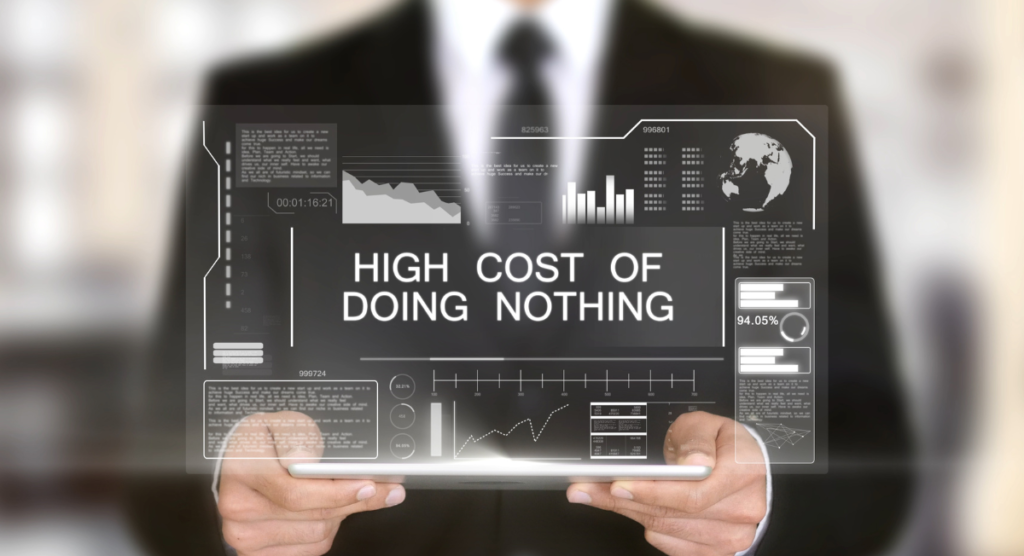 A business professional holds a digital display reading “High Cost of Doing Nothing,” underscoring why SaaS founders must clarify their story before chasing growth.