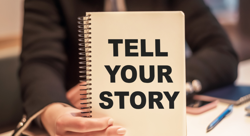 A founder holds a notebook reading “Tell Your Story,” reinforcing that clear, personal narrative must shape a SaaS product’s value before investing in growth channels.